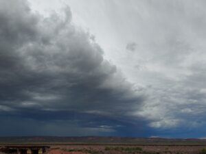 Storm coming in, Texas. Wall cloud angled, and dark blue sky.